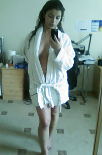 busty indian girl in her bedroom posing