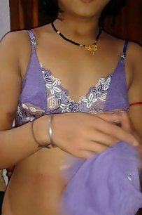 amateur indian wife opening her blouse to show off boobs