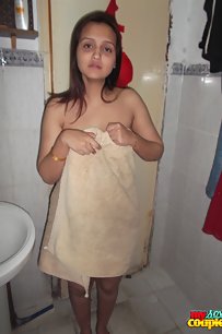 Horny Sonia getting ready for wedding party in toilet naked
