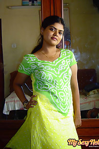 Neha bhabhi in green and yellow Indian shalwar suit