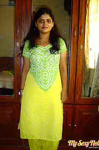 Neha bhabhi in green and yellow Indian shalwar suit