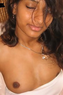 young indian gf on beach taking her bikini off