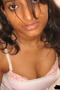 young indian gf on beach taking her bikini off