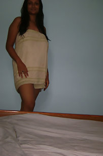india girl after shower unwrapping her towel