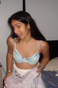 indian in her night suits posing on camera