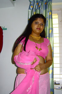Delicious Indian Neha bhabhi stripping her pink saree off showing pussy