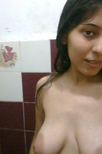 hot indian girl posing in bedroom