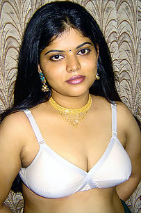 Gorgeous Neha Nair in white bra giving seductive poses and playing with bigtits