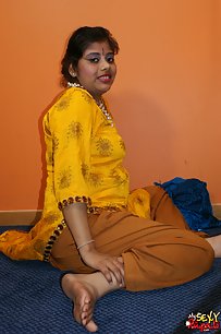Horny looking Rupali bhabhi in yellow shalwar suit looking hot