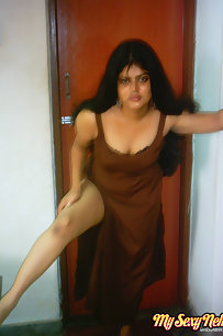 Gorgeous Neha bhabhi in bedroom stripping her brown nighty