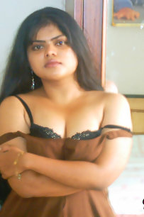 Gorgeous Neha bhabhi in bedroom stripping her brown nighty