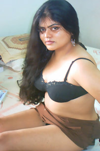 Gorgeous Neha bhabhi in bedroom stripping her brown nighty