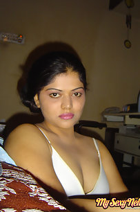 Neha Indian bhabhi showing off her big boobs in yellow camisole