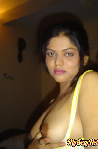 Neha Indian bhabhi showing off her big boobs in yellow camisole