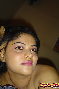Neha Indian bhabhi showing off her big boobs in yellow camisole