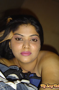 Neha Indian bhabhi showing off her big boobs in yellow camisole
